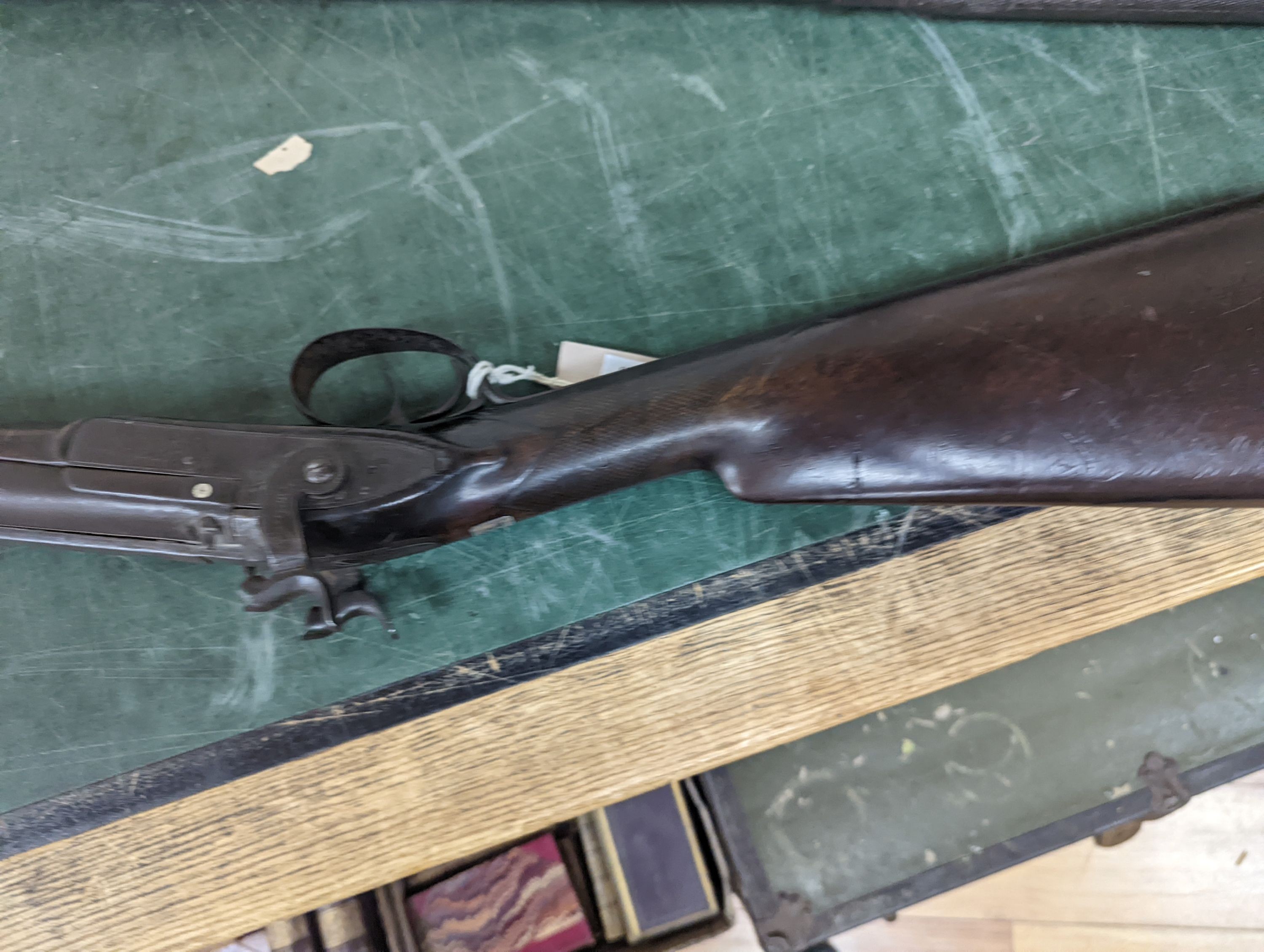 Two 19th century percussion muskets, 103cm. max., one double-barrelled